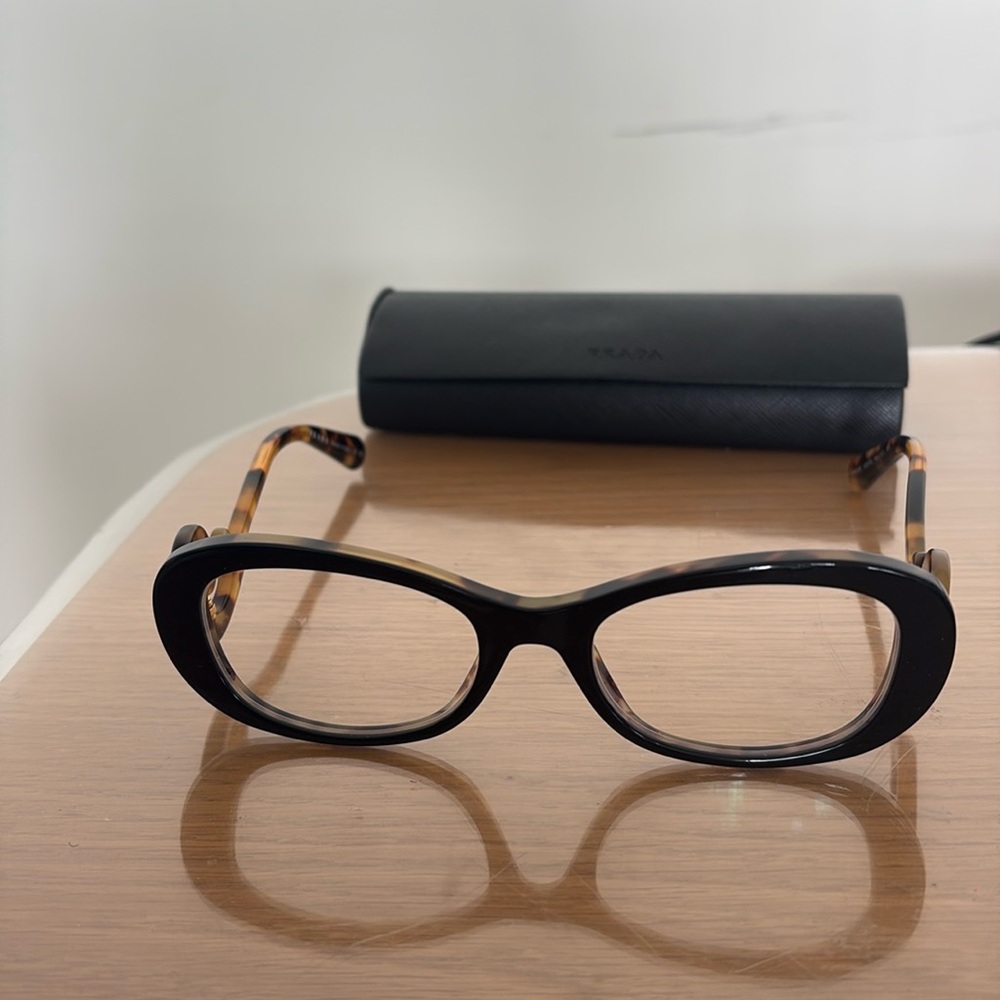 Prada eye glasses 
model: BP 11850774
leopard
original:$430